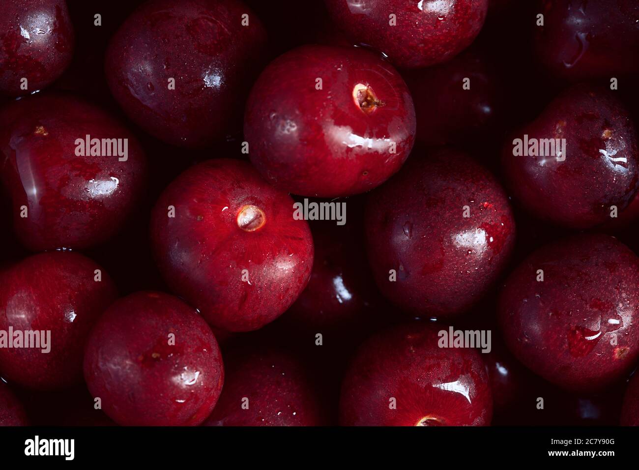 texture photo de beaucoup de fraiches fraîches mûres noir cerises fond, personne Banque D'Images