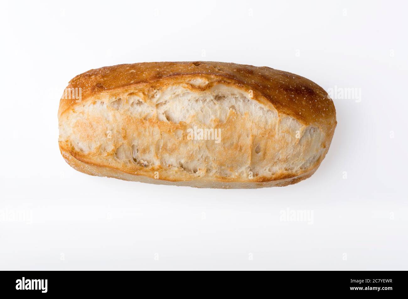 Petite baguette française isolée sur fond clair. Banque D'Images