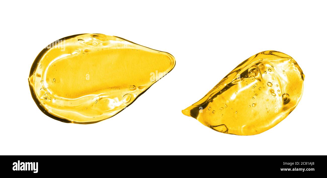 Jeu de traits de gel dorés assortis. Texture du sérum. Gel avec bulles dans le frottis Banque D'Images