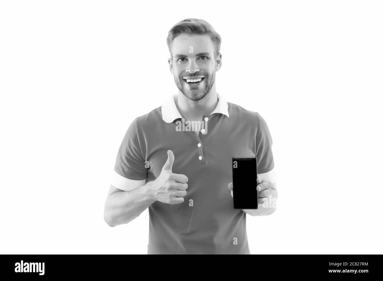 Meilleur téléphone pour la navigation. Joyeux gars donner des pouces jusqu'au téléphone. Un homme qui tient le téléphone portable. 3 G. 4 G. Mode de vie mobile. Technologie de téléphonie mobile. Parfait pour les amateurs de technologie. Banque D'Images