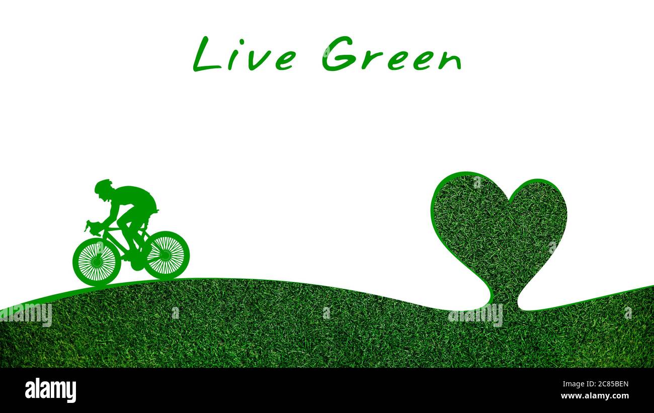 Vivre une vie verte, homme vert avec un vélo sur un monde vert, concept de durabilité Banque D'Images