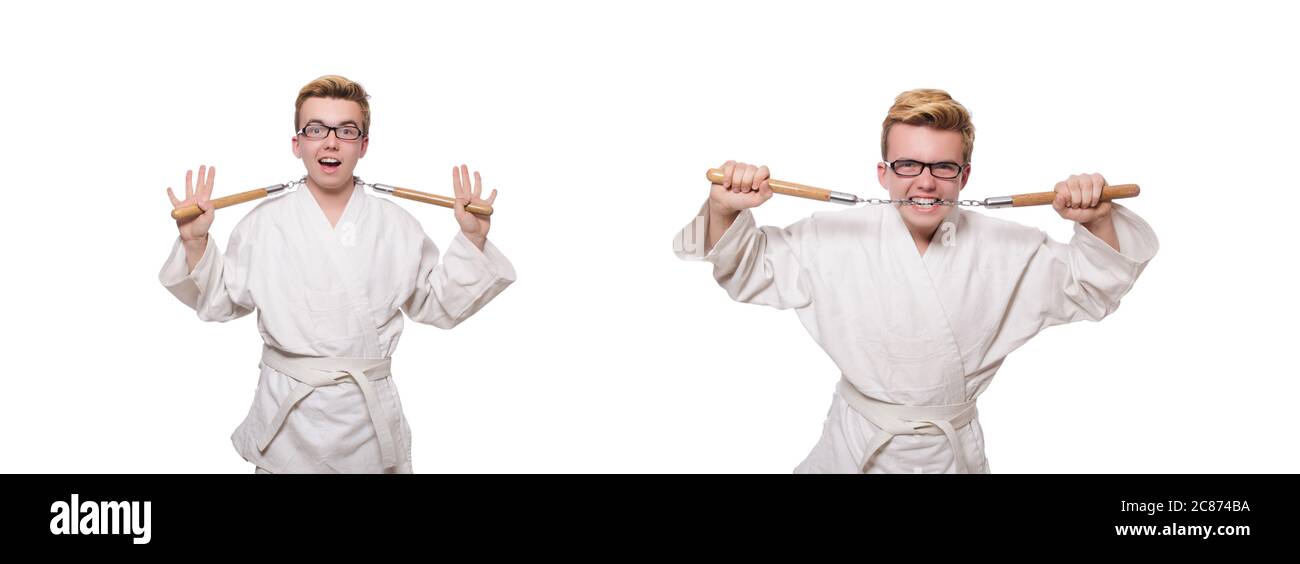 Le funny karate fighter avec nunchucks on white Banque D'Images
