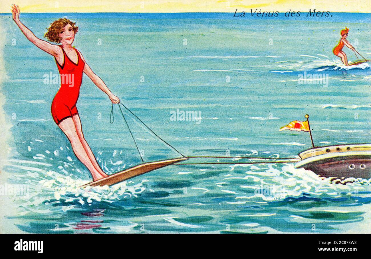 France - la Vénus des mers - une jeune femme en maillot de bain rouge qui profite du ski nautique. Vers 1930 Banque D'Images