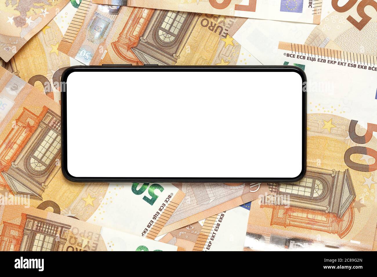 smartphone avec écran blanc sur cinquante billets en euros Banque D'Images