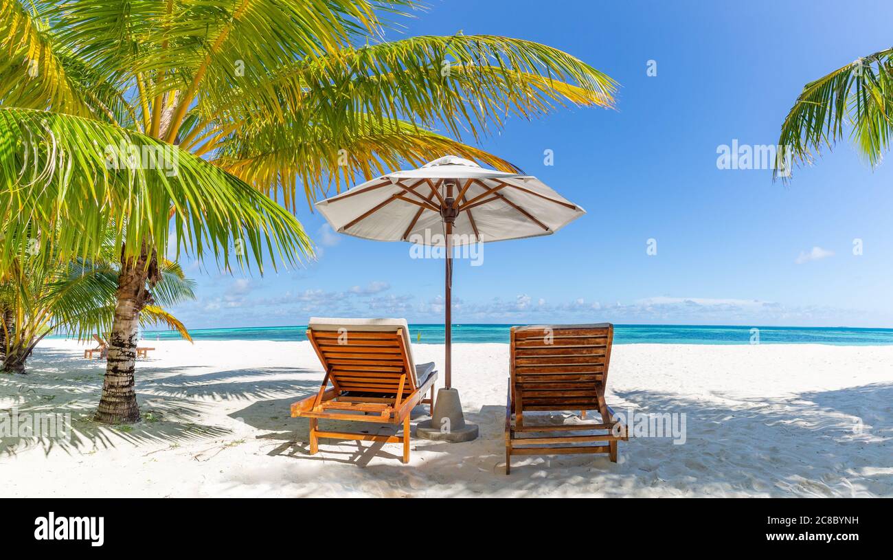 Scène de plage parfaite. Paysage tropical idyllique de plage pour l'arrière-plan ou le papier peint. Conception du tourisme pour vacances d'été concept. Plage de luxe Banque D'Images