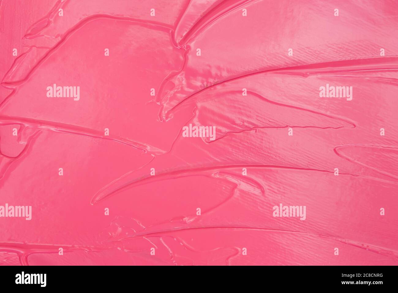 Texture rouge à lèvres rose crémeuse. Traces de maquillage de brillant à lèvres mat Banque D'Images