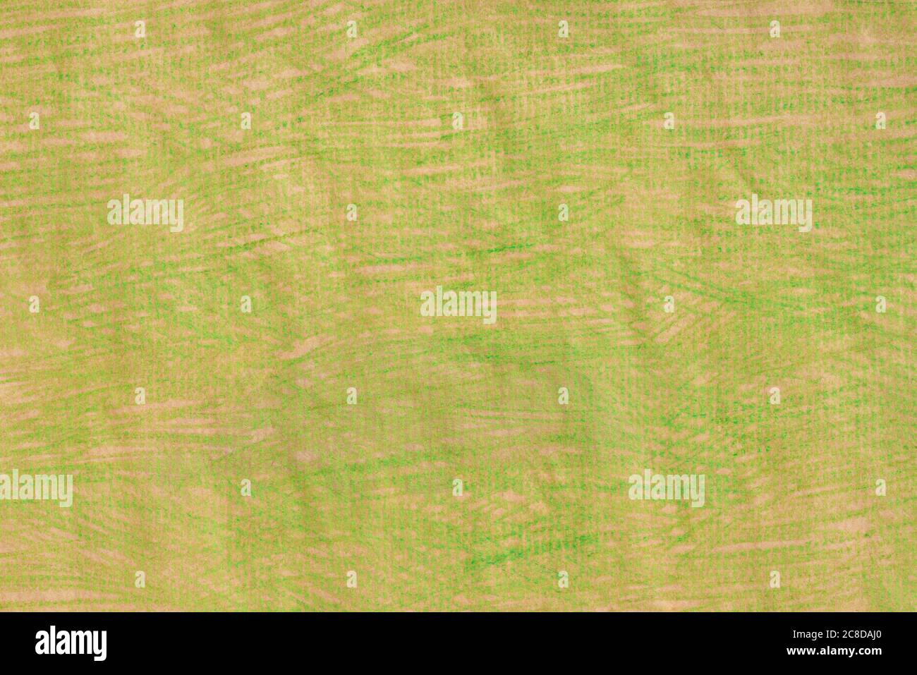 crayon vert dessinant sur fond papier recyclé Banque D'Images