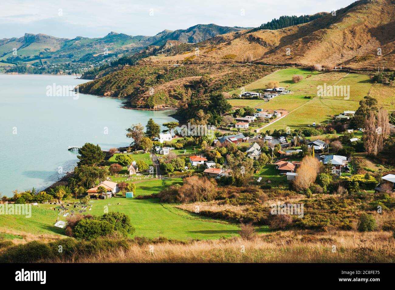 Une petite colonie à Rapaki Bay, péninsule Banks, Nouvelle-Zélande Banque D'Images