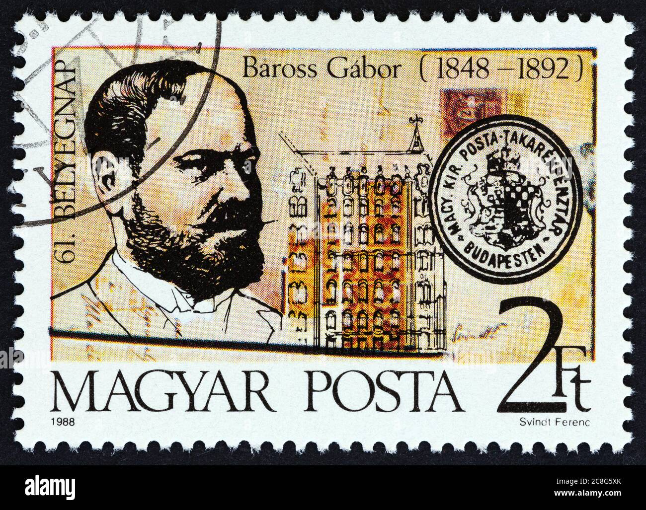 HONGRIE - VERS 1988: Un timbre imprimé en Hongrie émis pour le 140e anniversaire de naissance de Gabor Baross montre Baross et la banque postale d'épargne, Budapest. Banque D'Images
