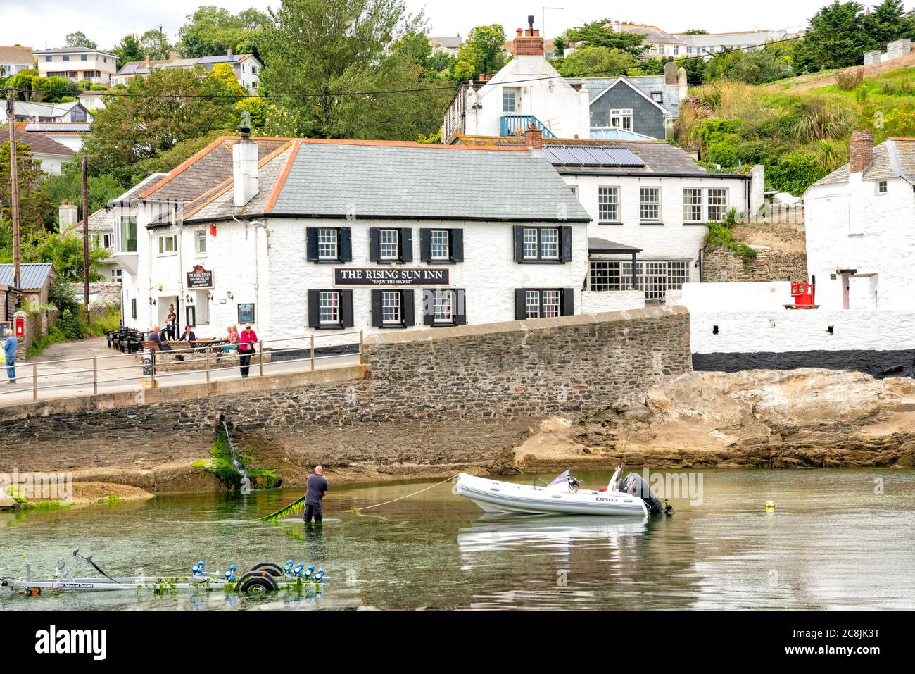 Village balnéaire de Portmellona avec le Rising Sun Inn, Cornwall, Angleterre, Royaume-Uni Banque D'Images