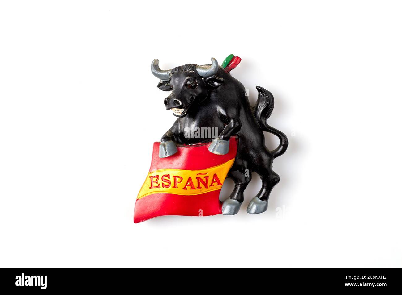 Souvenir touristique du taureau avec drapeau espagnol. Banque D'Images