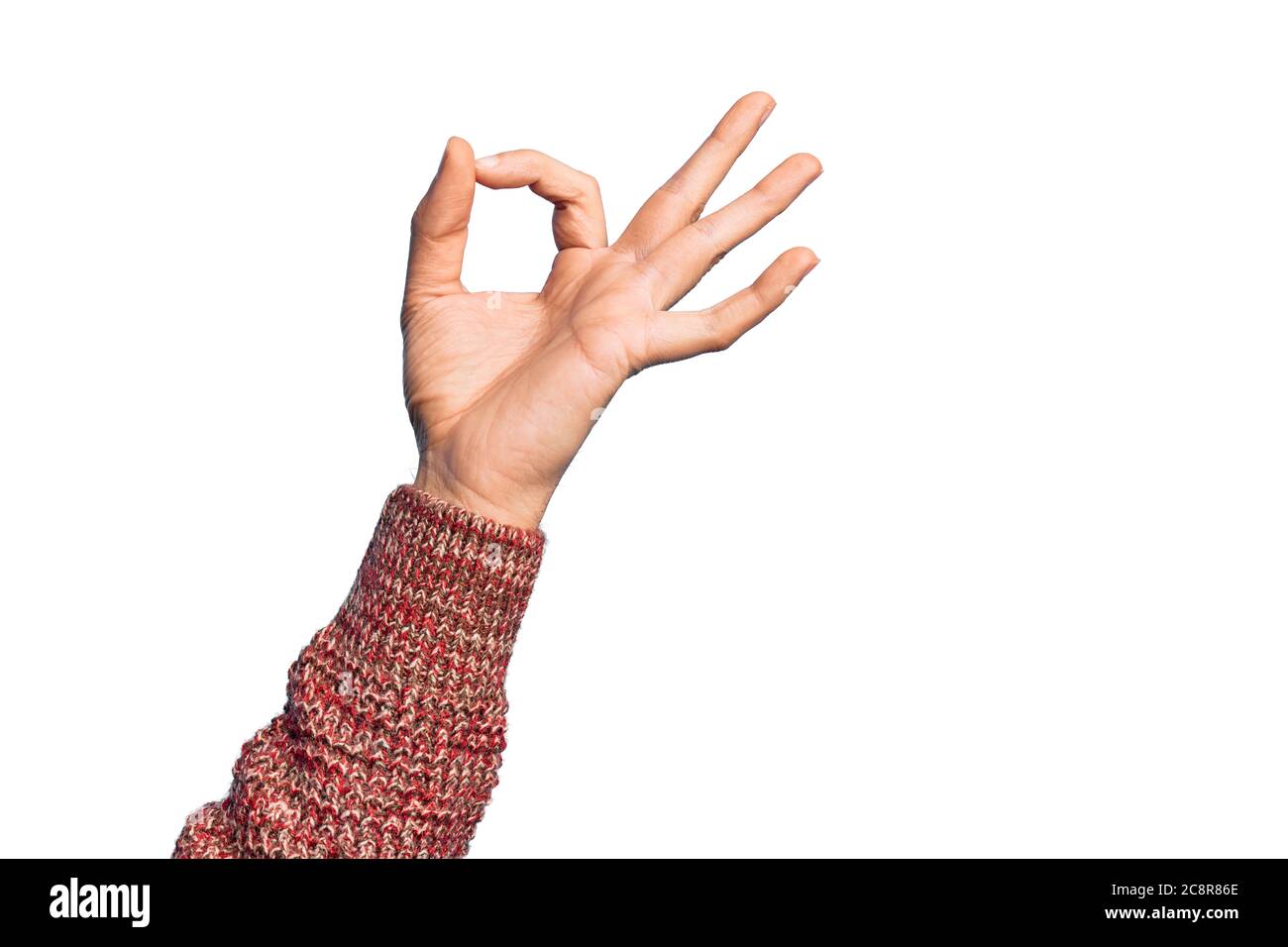 Main de jeune homme caucasien montrant des doigts sur fond blanc isolé gestuelle expression d'approbation faisant bon symbole avec les doigts Banque D'Images