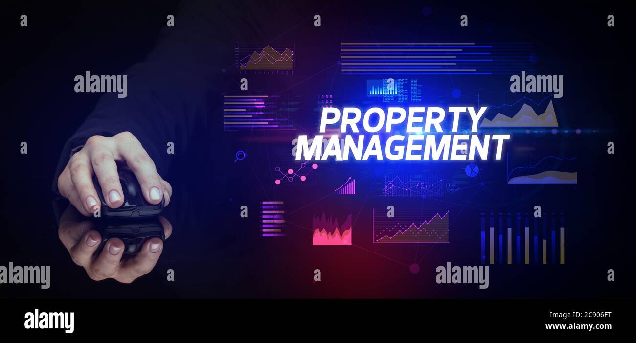 Main tenant périphérique sans fil avec inscription DE GESTION DE PROPRIÉTÉ, concept de cyber-business Banque D'Images