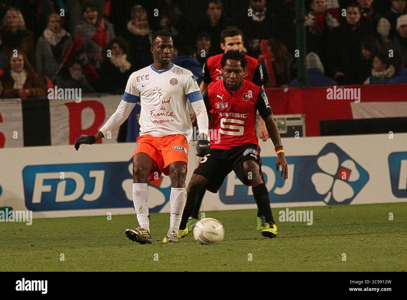 Jean II Makoun et John Utaka le coupé de la Ligue 2012 - 2013, Stade Rennais - Montpellier Herault le 16 janvier 2013 à Roazon Park, Rennes - photo Laurent Lairys / DPPI Banque D'Images