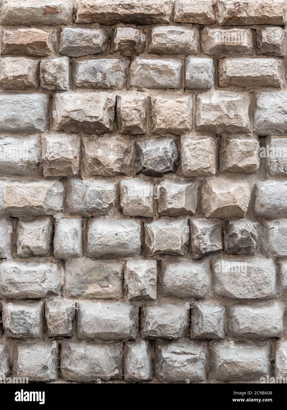 Arrière-plan d'un mur antique en pierre naturelle Banque D'Images