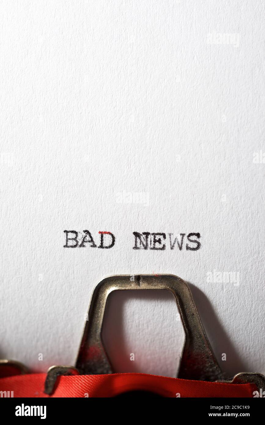 Mauvaise nouvelle texte écrit avec une machine à écrire. Banque D'Images