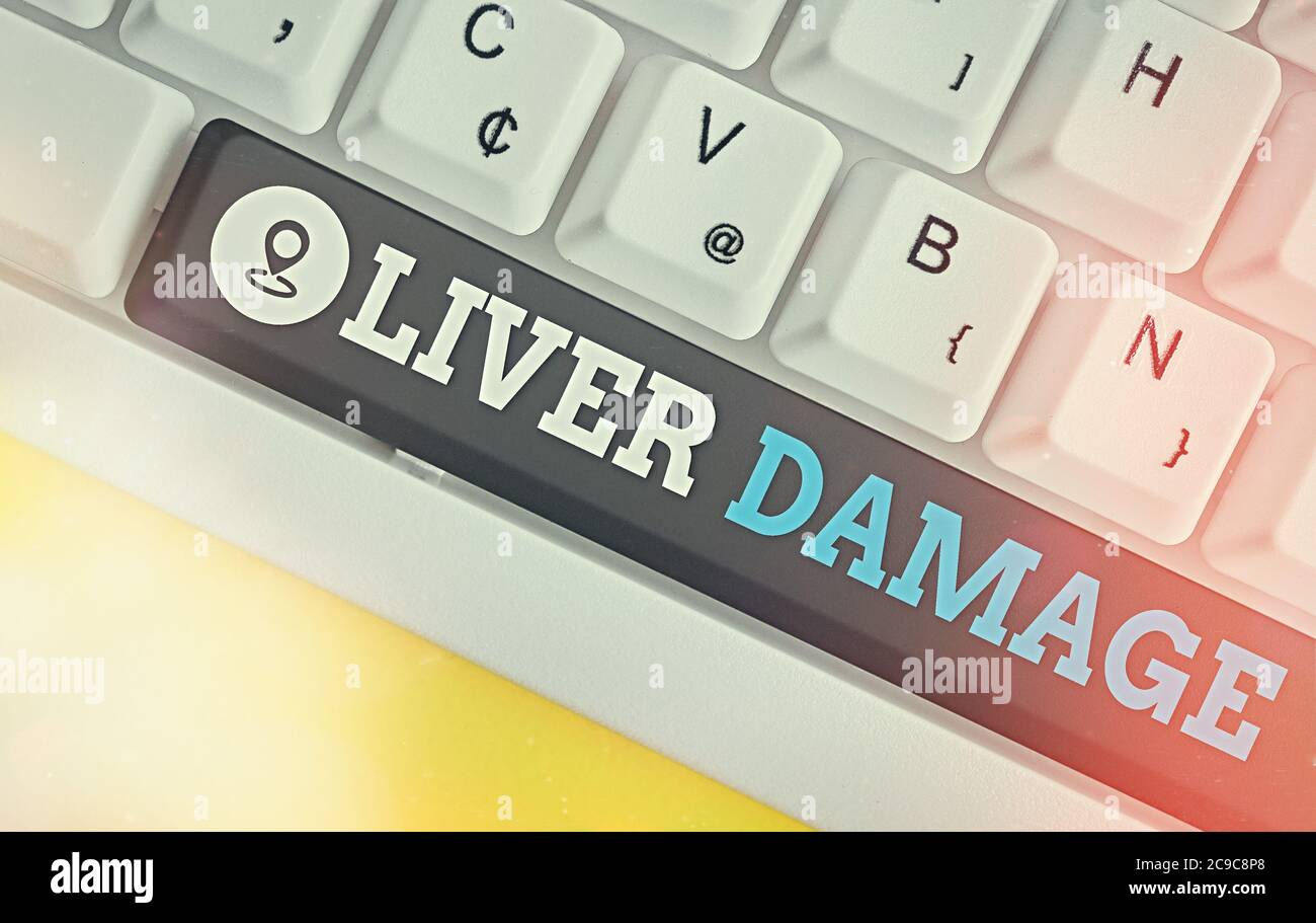 Texte écrit mot foie dommages. Photo d'affaires présentant tout trouble de la cirrhose du foie ou des cicatrices du foie touche de clavier de couleur différente Banque D'Images