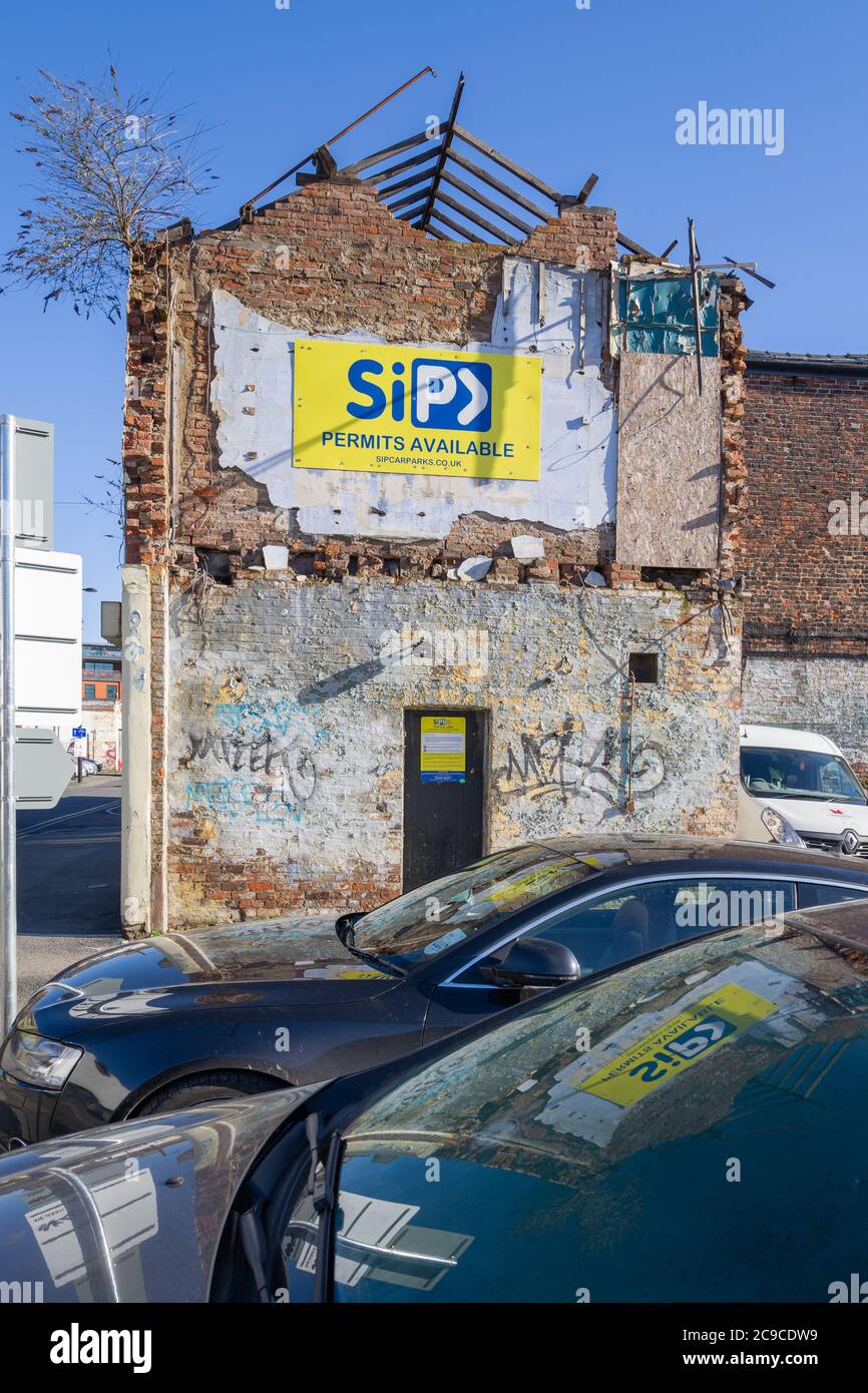 Parking SIP sur place de bâtiments démolis à Port Street, Manchester, Royaume-Uni Banque D'Images