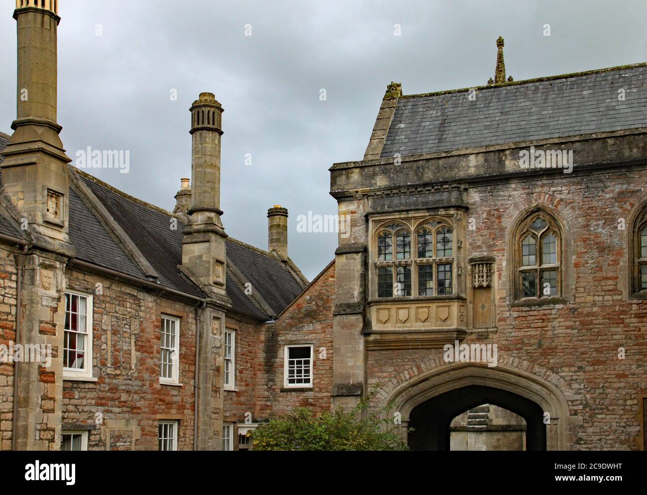 Le portier à l'entrée de Vicar's Close à Wells, Somerset Banque D'Images