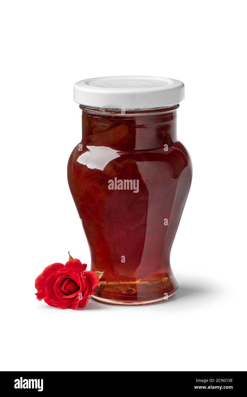 Pot en verre avec confiture de pétales de rose isolée sur fond blanc Banque D'Images