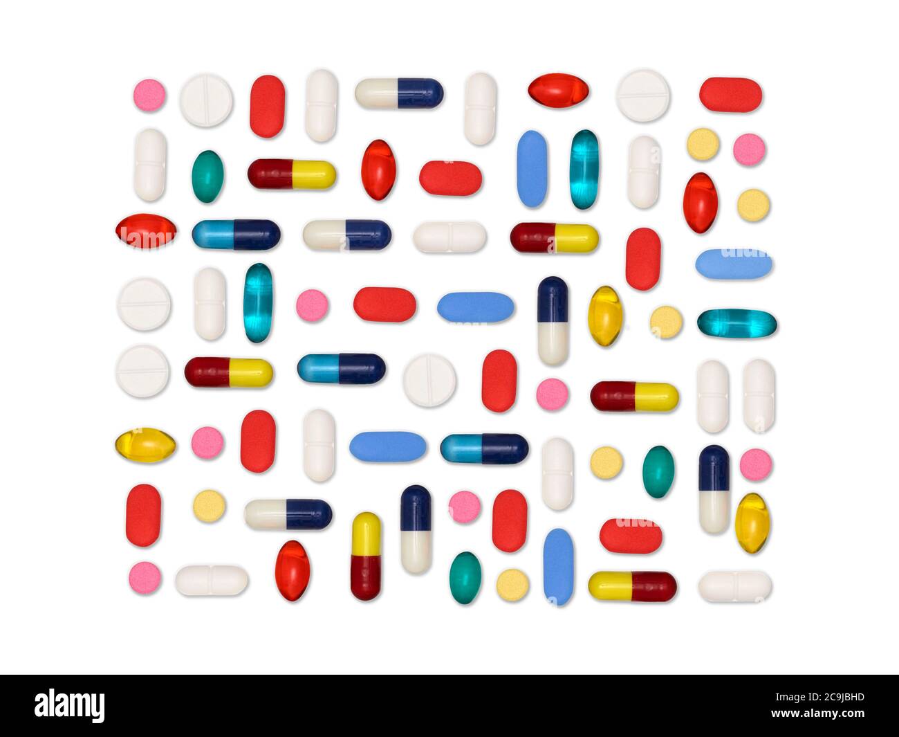 Pilules et capsules sur fond blanc. Banque D'Images