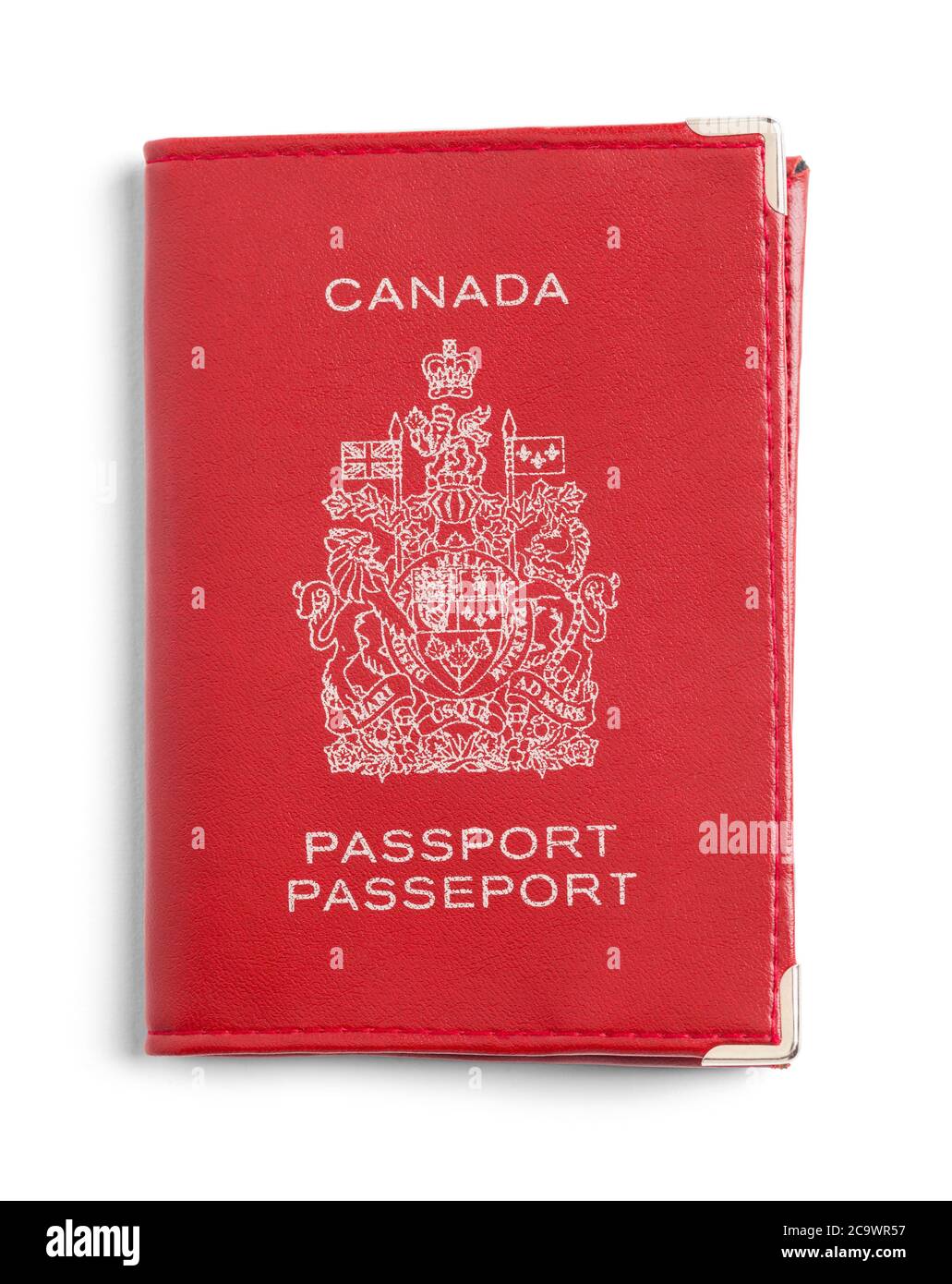 Passeport canadien rouge isolé sur fond blanc. Banque D'Images