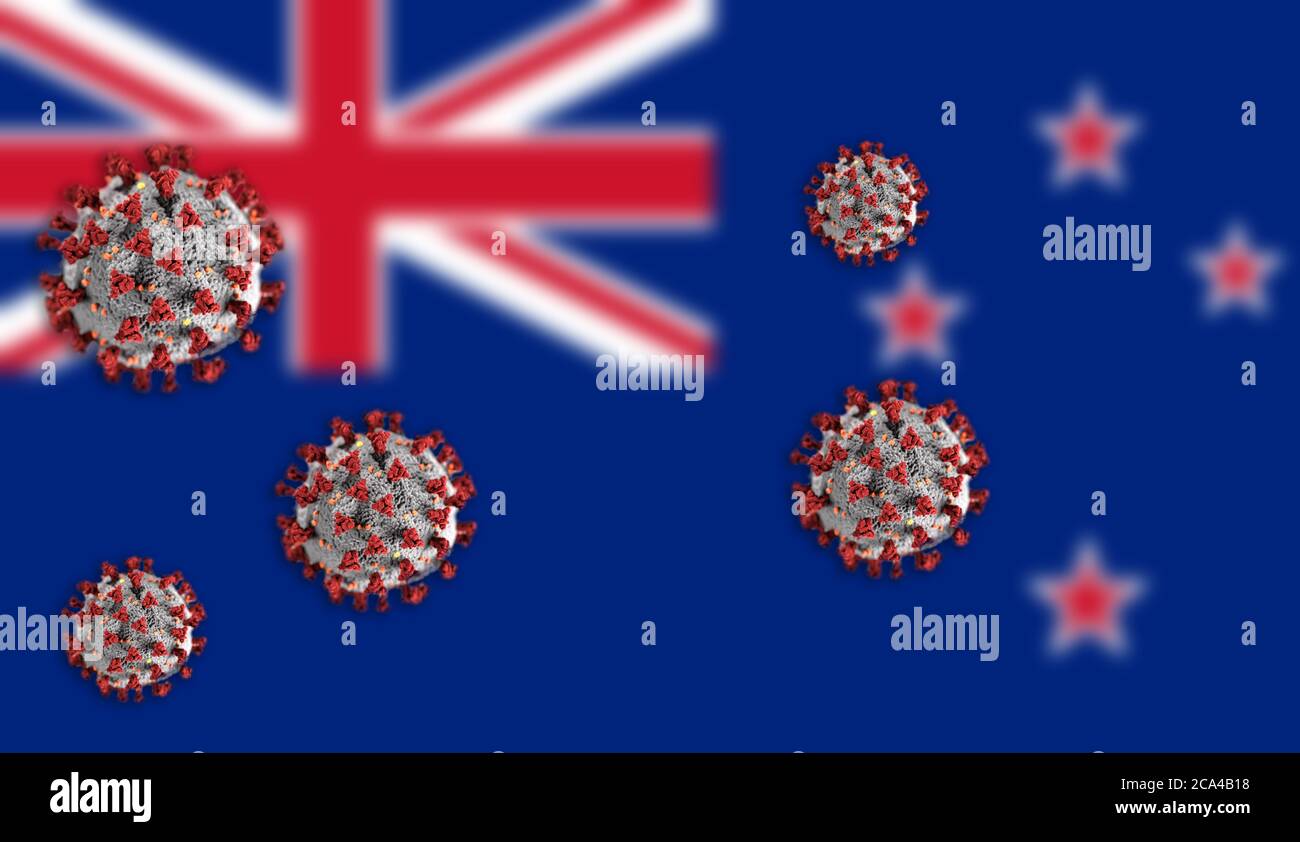 Concept de coronavirus ou de particules Covid-19 qui éclipsent le drapeau flou de la Nouvelle-Zélande en arrière-plan. Banque D'Images