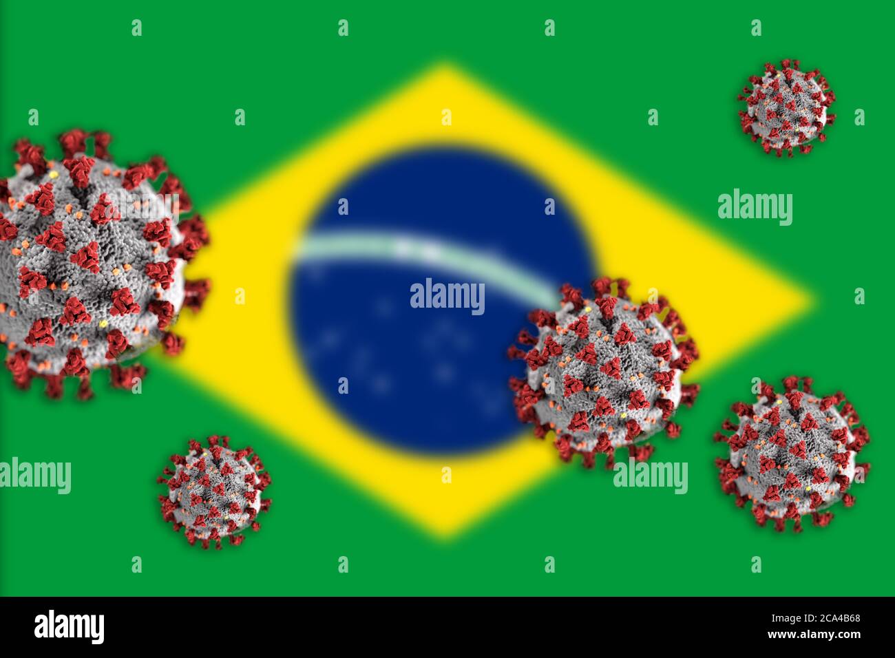 Concept de coronavirus ou de particules Covid-19 qui éclipsent le drapeau flou du Brésil en arrière-plan. Banque D'Images