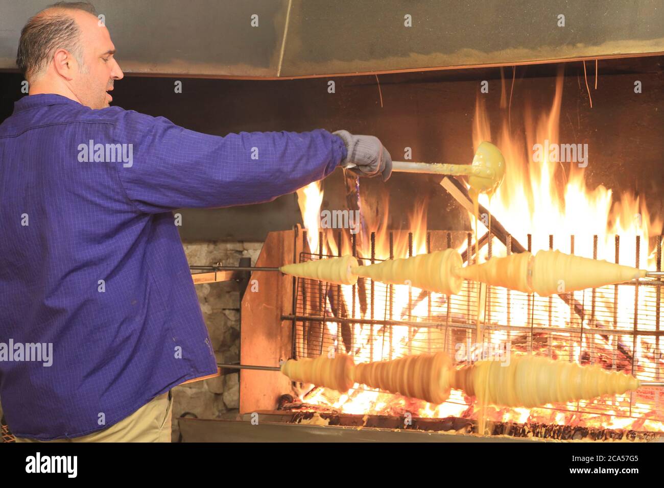 France Aveyron Millau Maison Alibert Production Artisanale De Gateau A La Broche Cuit Au Feu De Bois Photo Stock Alamy