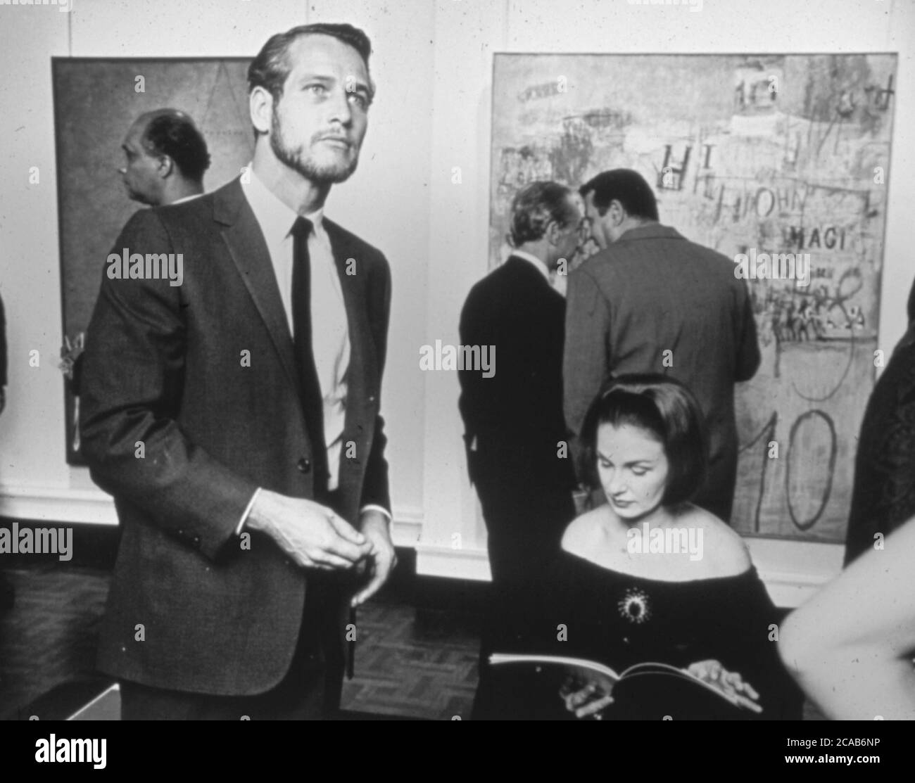 Paul Newman et Joanne Woodward à l'ouverture de Magnet New York (1964) Banque D'Images