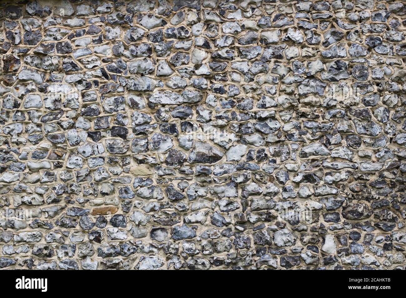 Texture de mur en pierre de silex traditionnelle Banque de — free download