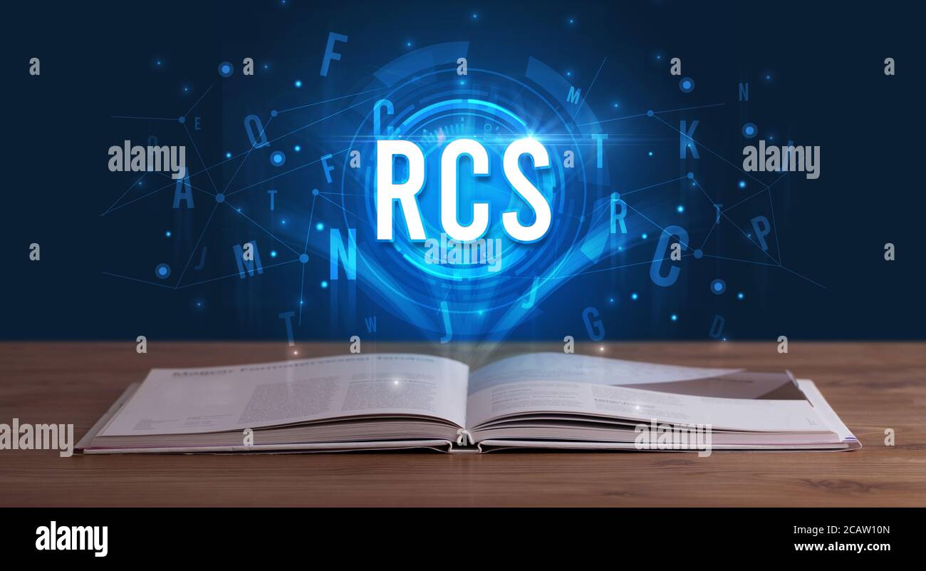 Inscription RCS venant d'un livre ouvert, la technologie numérique concept Banque D'Images