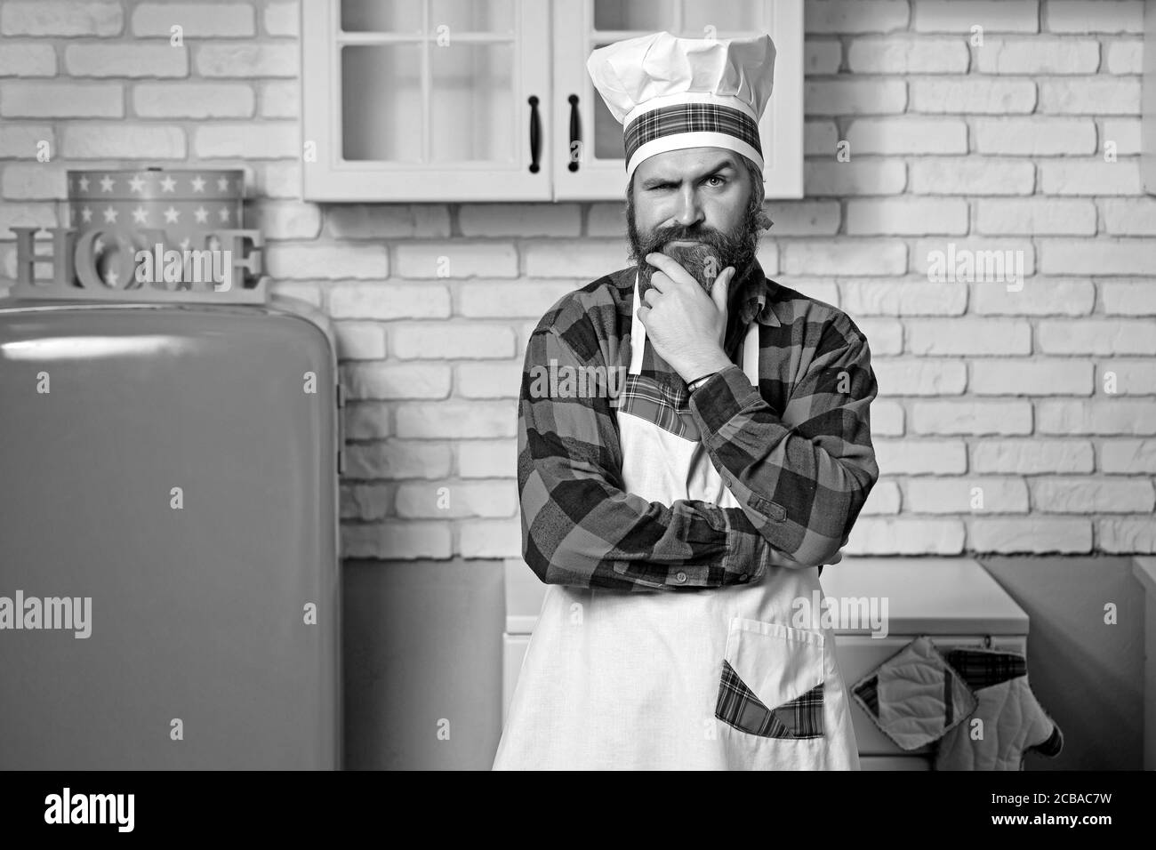 Portrait de barbu sur un élégant cook cuisine. Banque D'Images