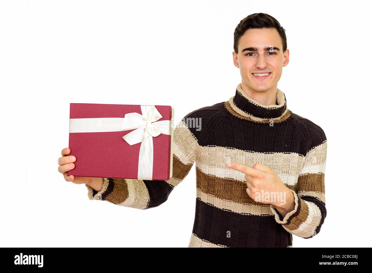 Portrait du jeune heureux beau homme prêt pour Noël Banque D'Images