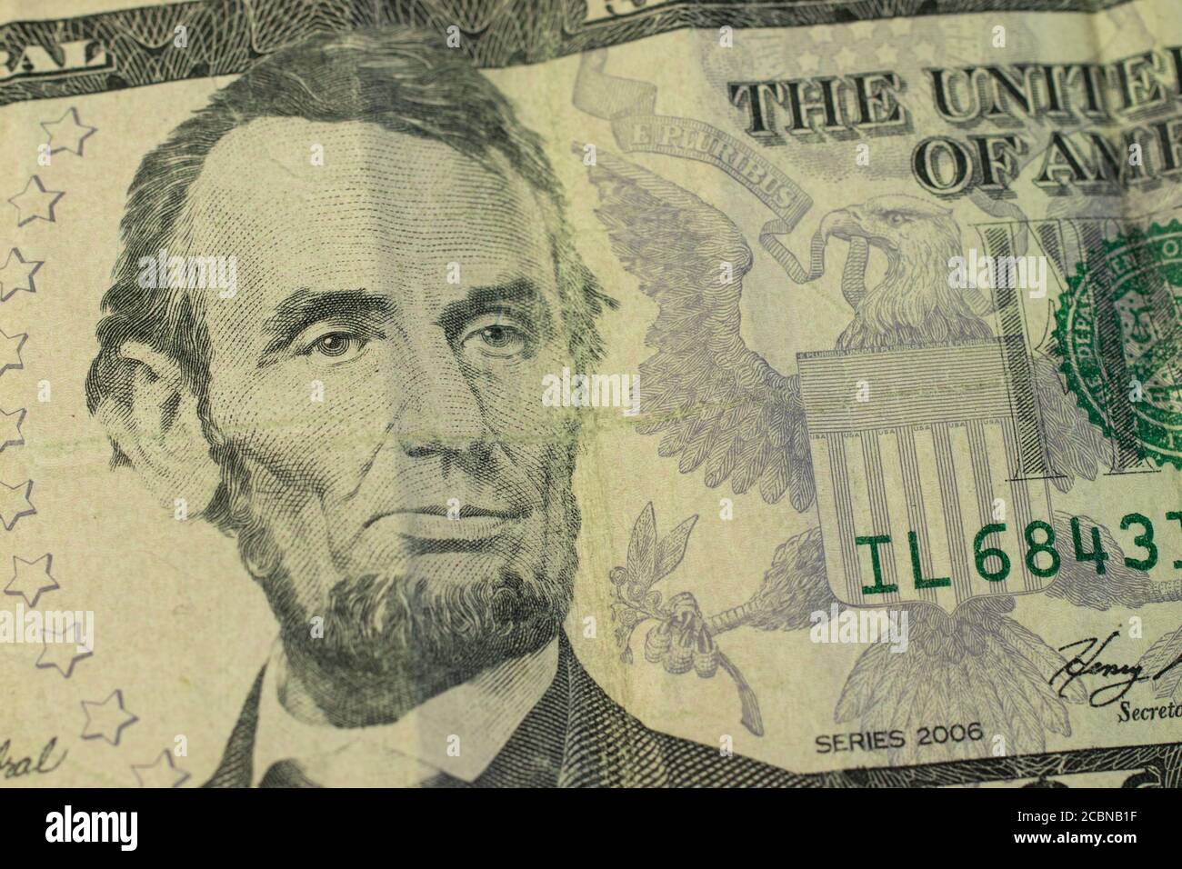 Abraham Lincoln portrait sur cinq dollars billet macro Banque D'Images