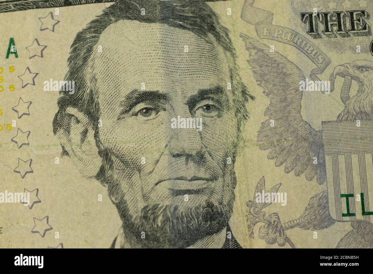 Photo macro du président Lincoln sur un billet de 5 dollars Banque D'Images