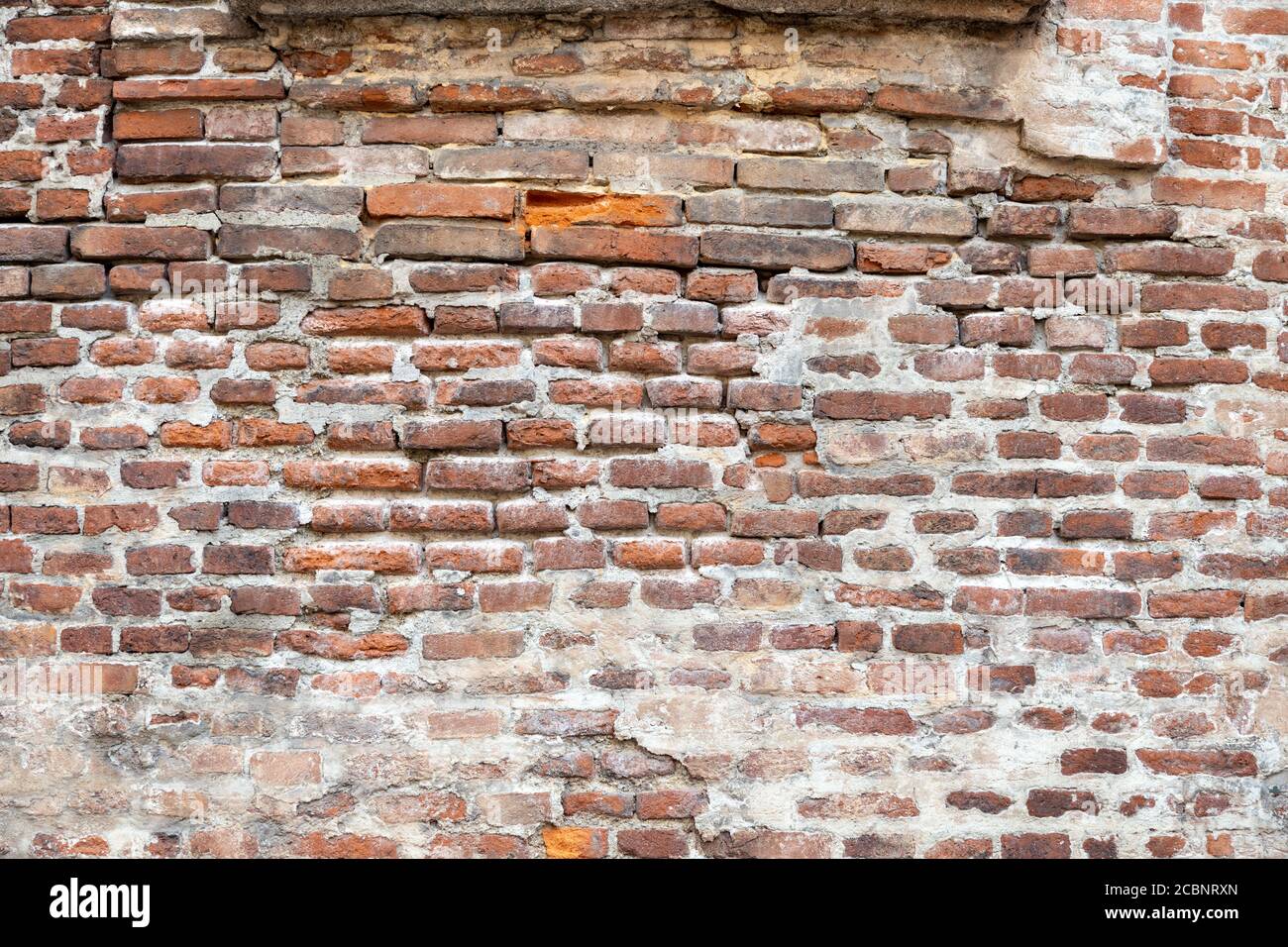 texture vieux mur de briques rouges en ruines Banque D'Images