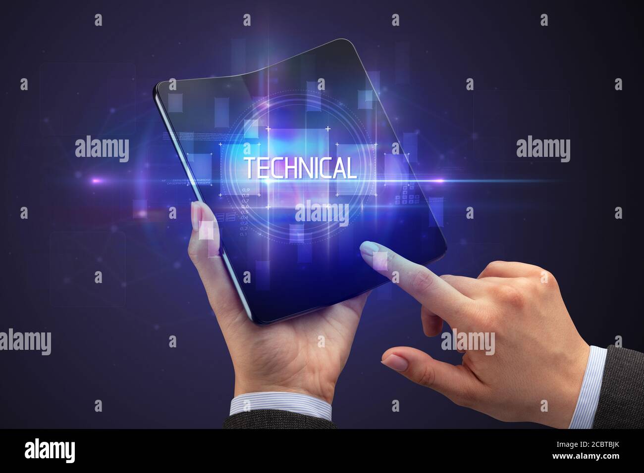 Businessman holding a smartphone pliable avec inscription technique, nouvelle technologie concept Banque D'Images