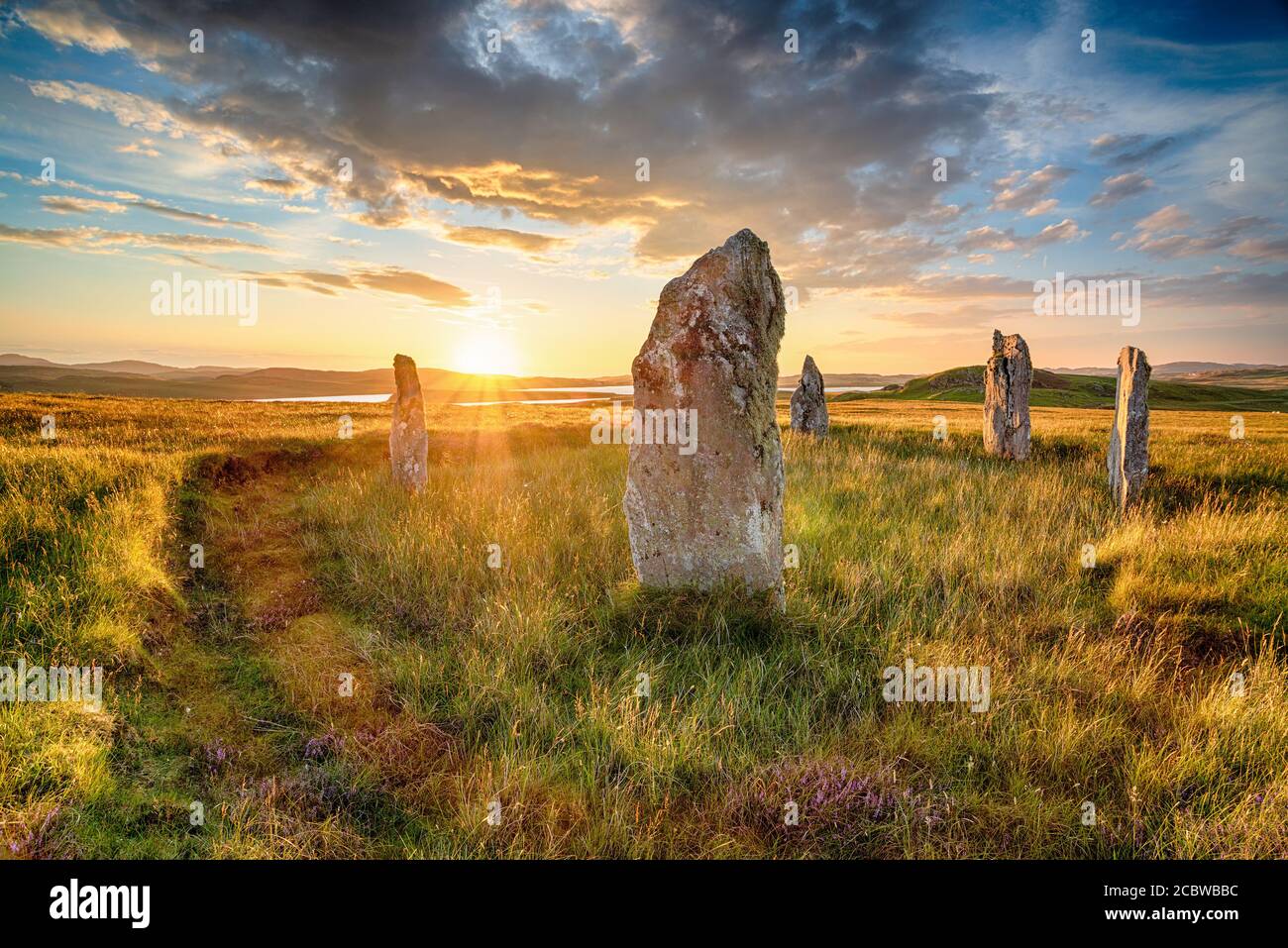 Coucher de soleil sur le cercle de pierre de Ceann Hulavig sur l'île de Lewis dans les Hébrides d'Écosse, également connu sous le nom de Callanish 4 Banque D'Images