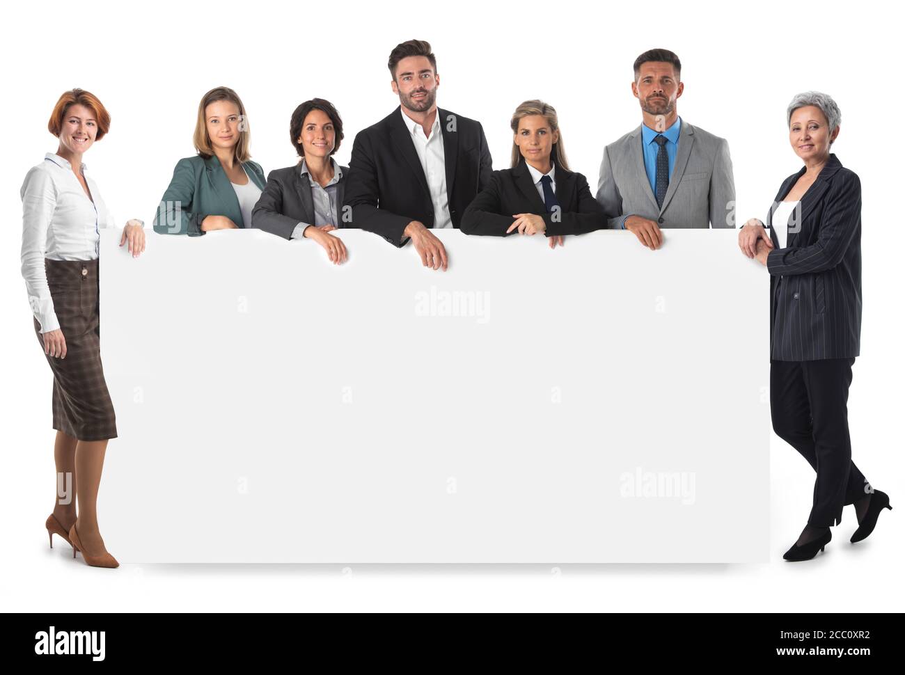 Groupe de gens d'affaires avec bannière vierge isolée sur blanc Banque D'Images