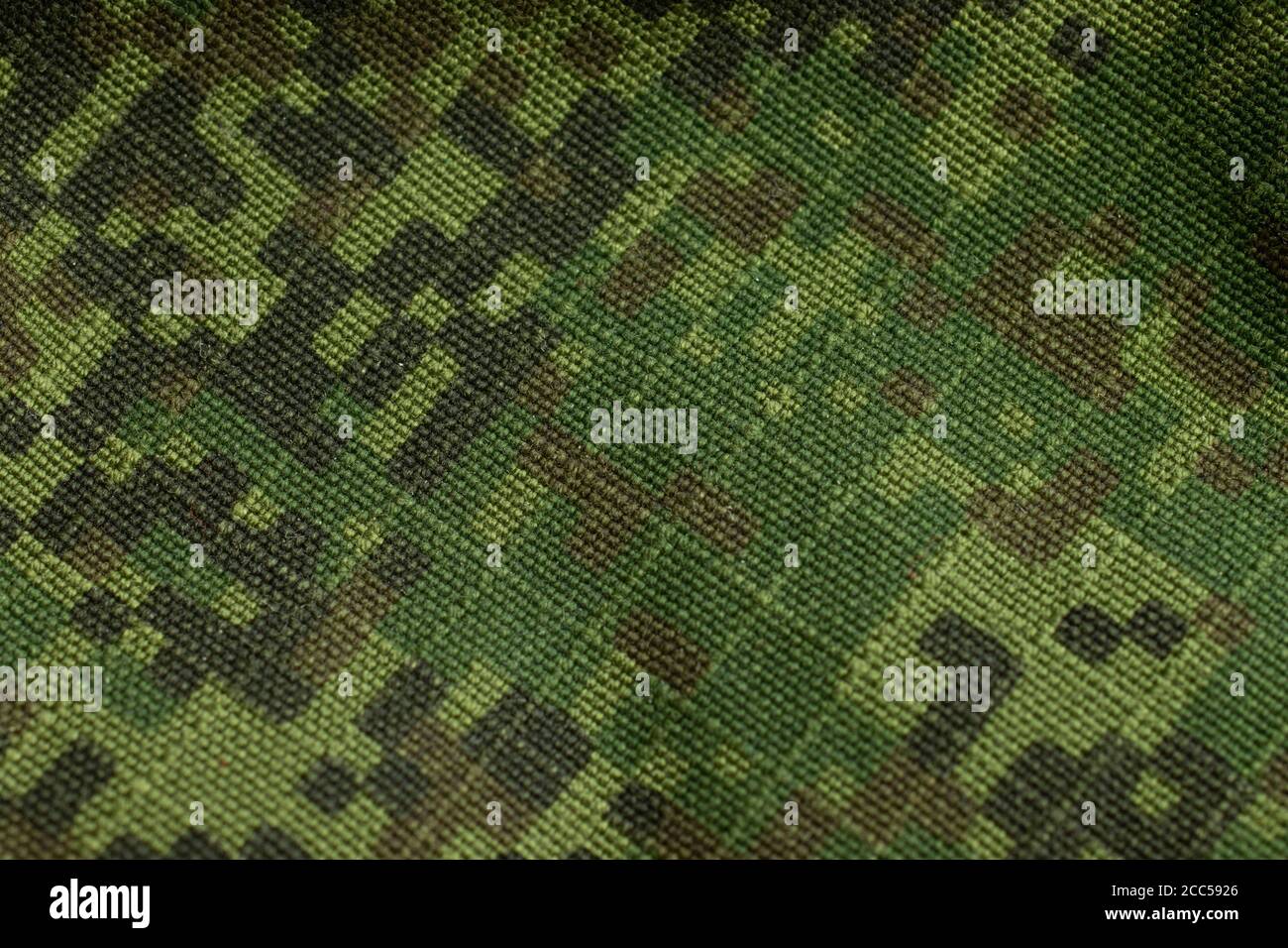 Texture textile militaire verte. Toile de fond de tissu de l'armée Banque D'Images