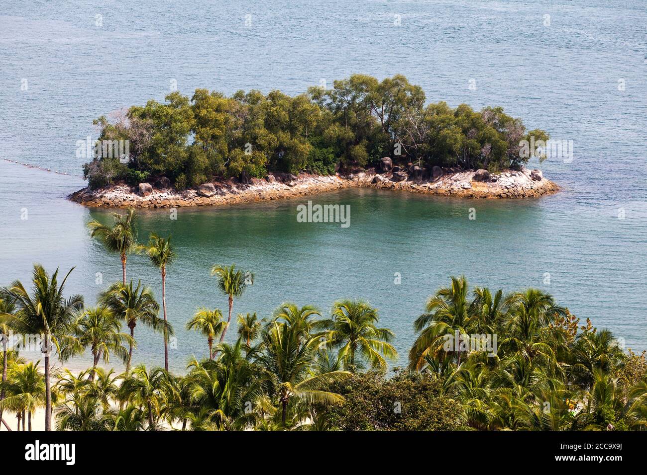Le concept des acheteurs fortunés récupèrent des îles privées « refuges » pour fuir la pandémie ou les sévères changements climatiques mondiaux. Banque D'Images