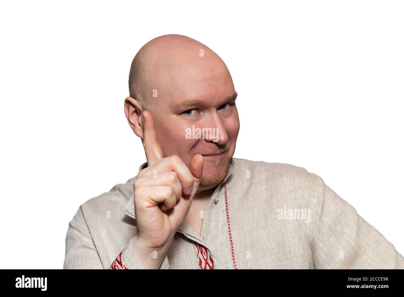 Un homme en robe nationale secoua un index éloquent Banque D'Images