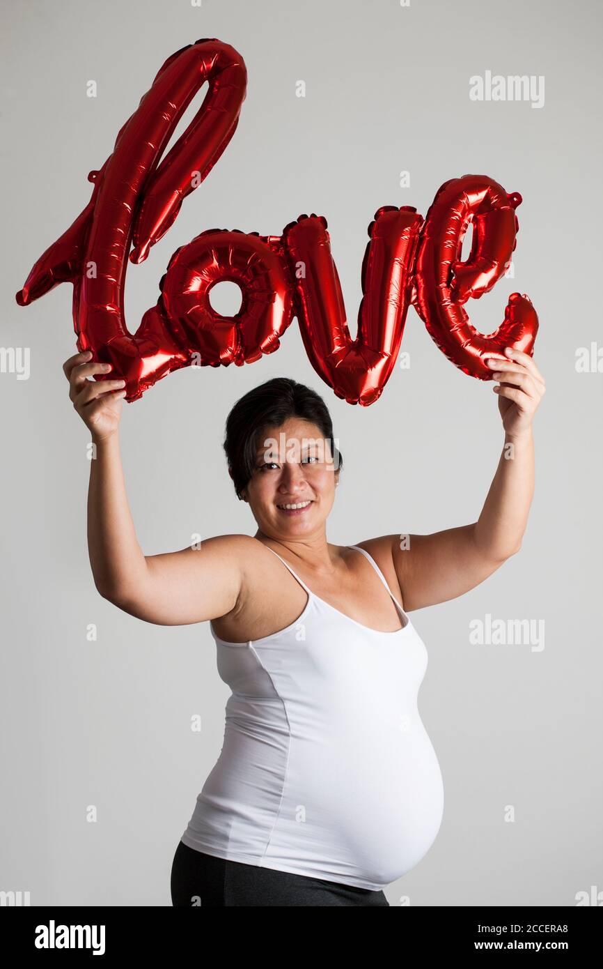Amour maternel, conceptual image Banque D'Images