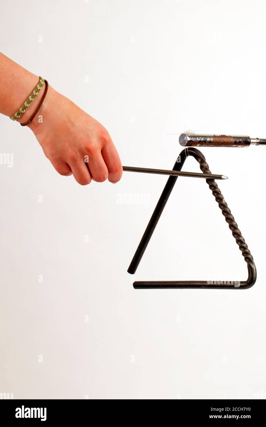 Triangle percussion instrument Banque de photographies et d’images à ...
