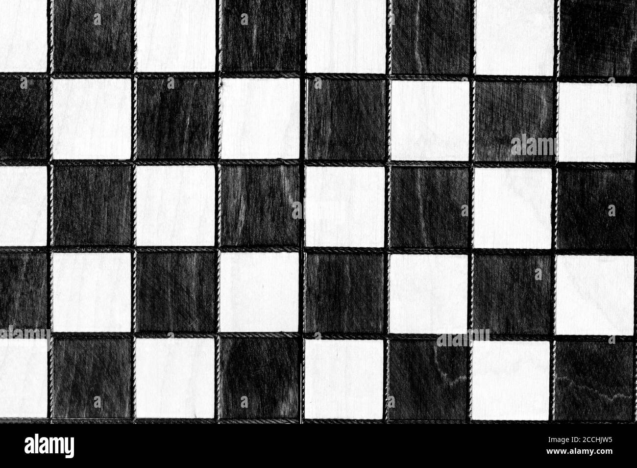 Image en noir et blanc d'arrière-plan de jeu d'échecs en bois vintage Banque D'Images