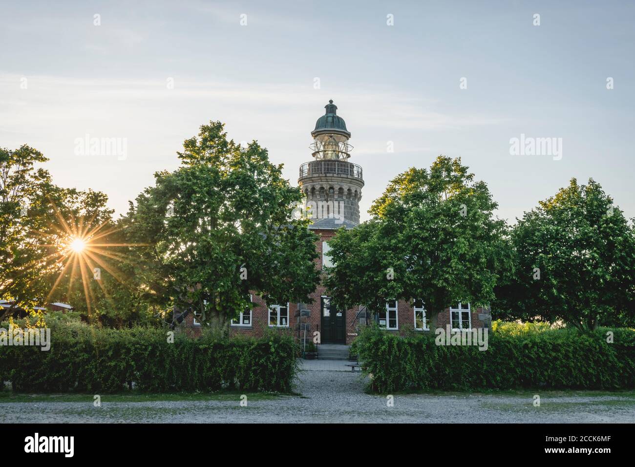Danemark, région du Sud du Danemark, Soby, phare de Skjoldnaes au coucher du soleil Banque D'Images