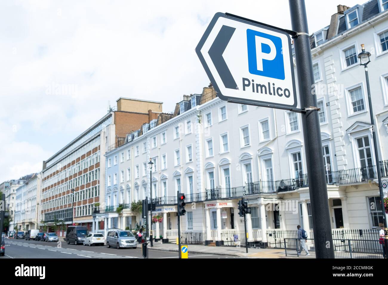 London- panneau de parking sur la rue des maisons à Pimlico Banque D'Images