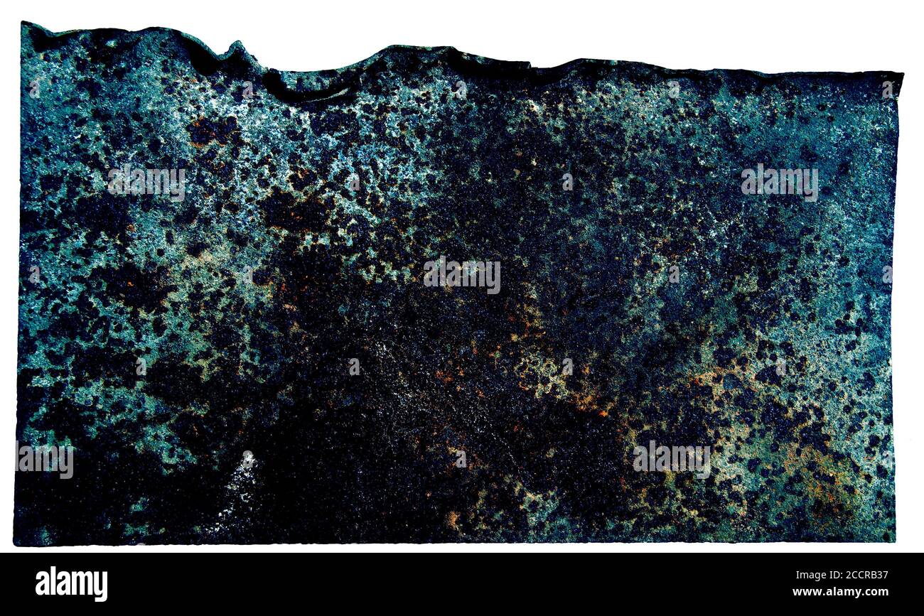 Morceau de charred placage d'un vaisseau spatial extraterrestre. Un morceau de tôle rouillée. Texture, arrière-plan Banque D'Images
