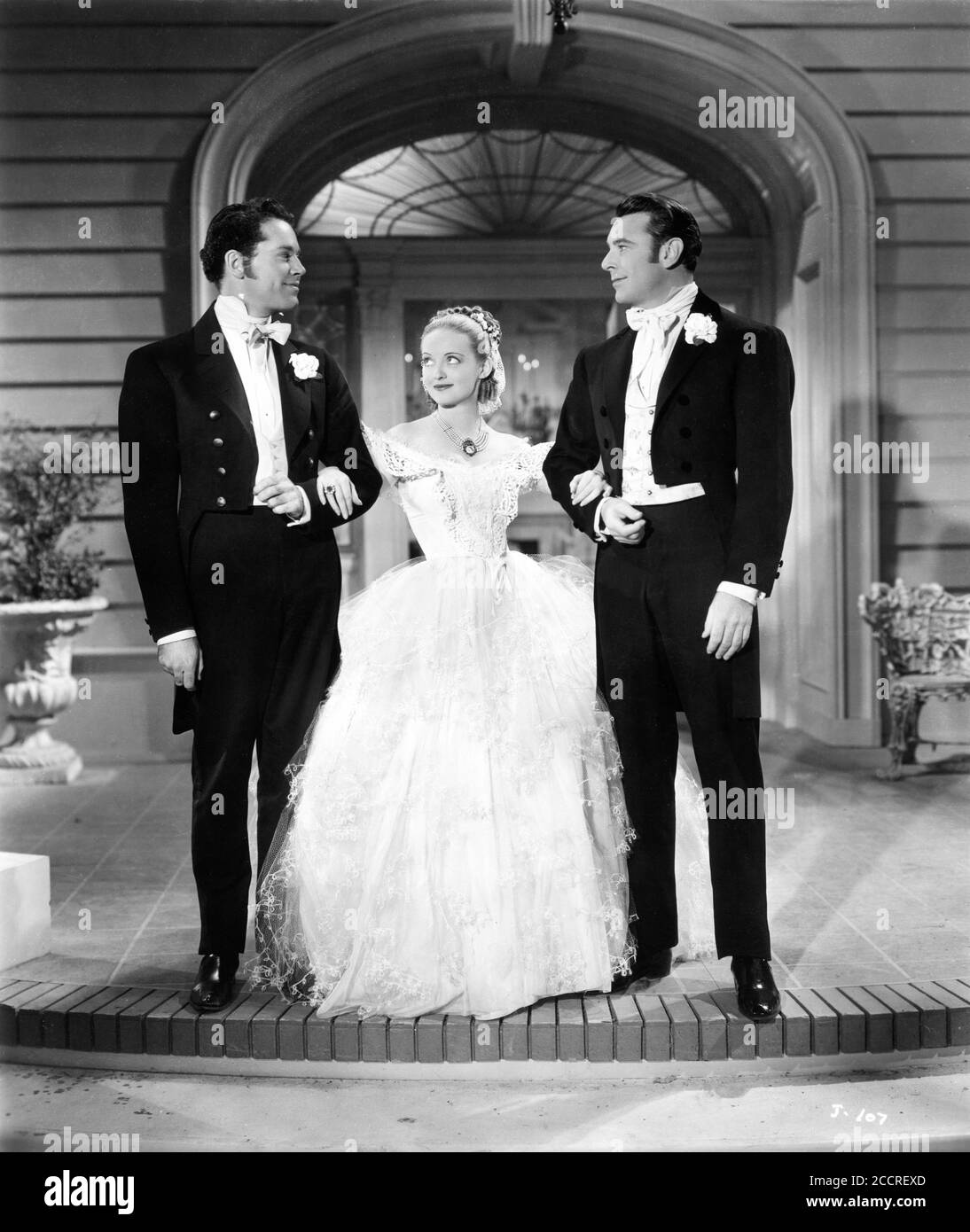 HENRY FONDA BETTE DAVIS et GEORGE BRANT à JEZEBEL 1938 réalisateur WILLIAM WYLER de la pièce de musique Owen Davis Max Steiner costumes Orry-Kelly Warner Bros. Banque D'Images